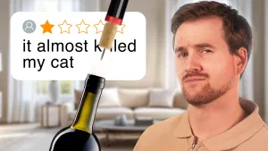 Video thumbnail showing Daniel portraited with a wine bottle and a pump wine opener and a bad written review stating "It almost k*lled my cat"