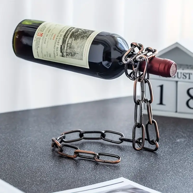 Iron chain wine bottle holder holding up a wine bottle
